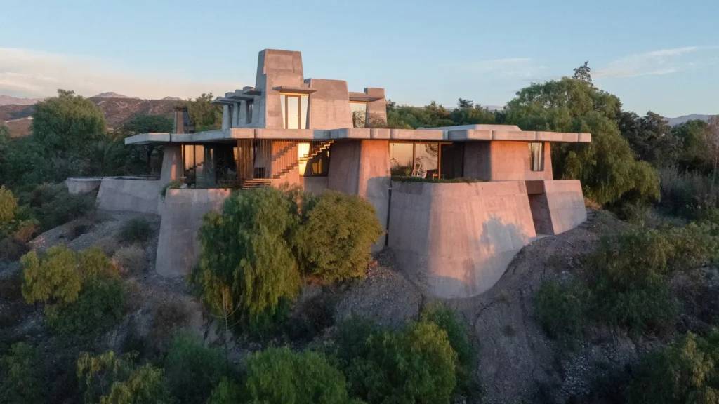 Modern mountain house exterior wide angle landscape shot